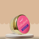 Oshaneeti lip balm container with pink label by gauneeti on a beige background