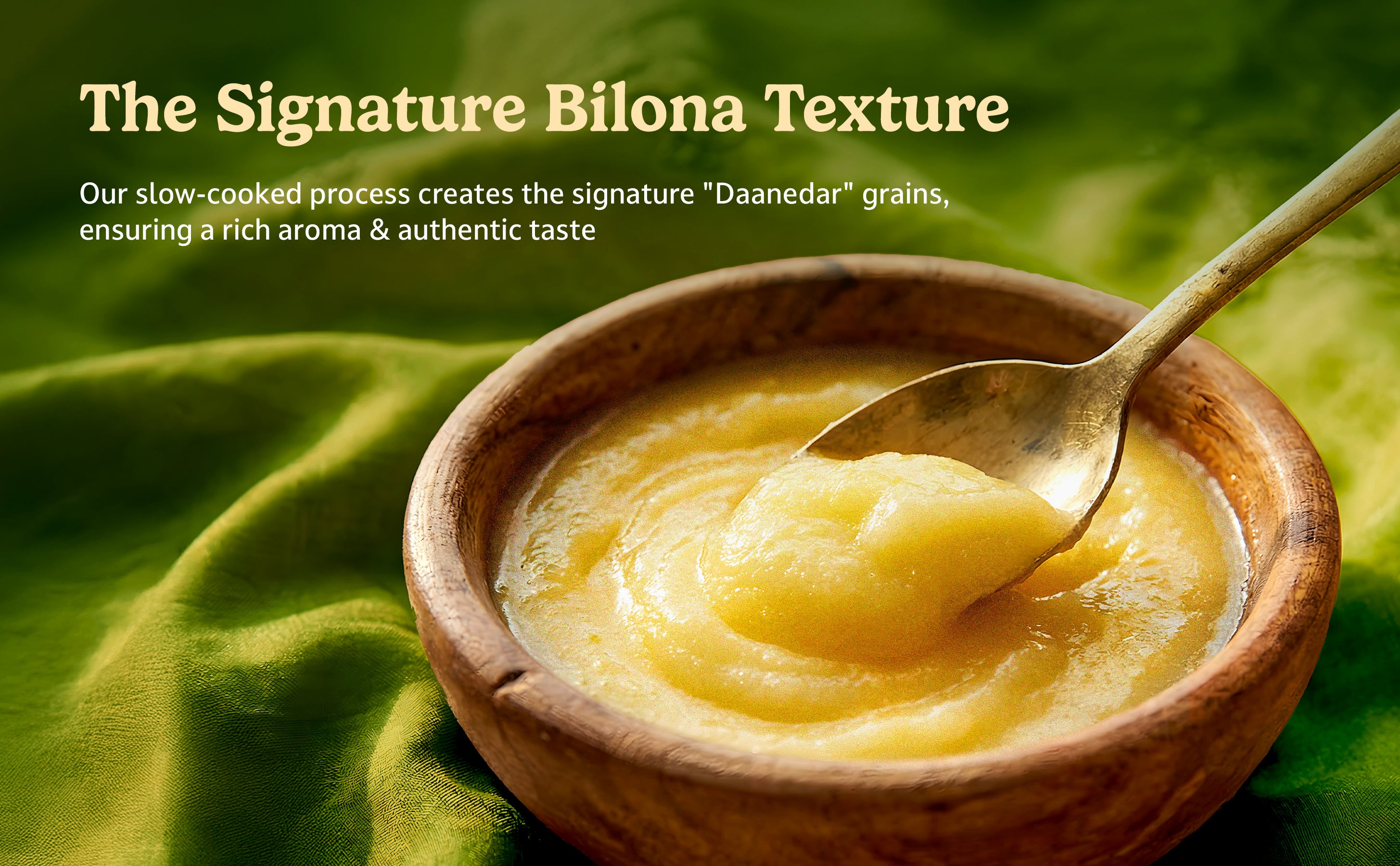 Wooden bowl with yellow Ghee and a spoon, on a green fabric background.