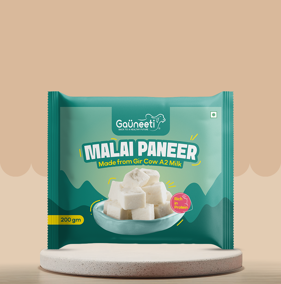 Packaging of Gauneeti Malai Paneer on a beige background.